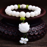 Lotus Bodhi Seed Bracelet – White beads with green accents and carved lotus pendant, natural meditation jewelry