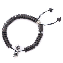 Coconut Shell Dorje Vajra Bracelet – Flat lay with silver prayer wheel pendant and lotus crown finial on black cord, Tibet...