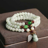 Jade Pixiu Maitreya Buddha Abundance Bracelet – Triple-wrap jade beads on stone box with green red accents, abundance