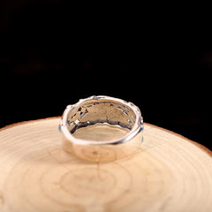 Sterling Silver Lotus Koi Ring - Hammered interior with turquoise accents on wood display, silver ring