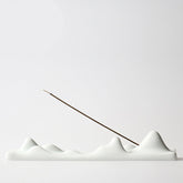 Mountain Cloud Incense Holder – White ceramic peaks with upright stick, minimalist