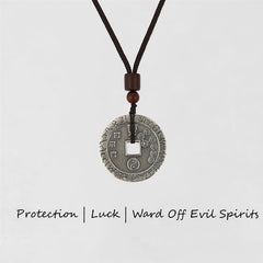Bagua Yin Yang Obsidian Necklace - silver coin pendant with yin-yang on black cord, wooden beads