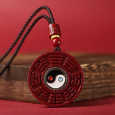 Cinnabar Bagua Rotatable Yin Yang Necklace – Red cinnabar Bagua pendant with Yin-Yang center on wood, Taoist amulet