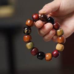 Wooden Prayer Bracelet – hand-held multi-color wood beads with gold Tibetan focal bead, men's bead bracelet