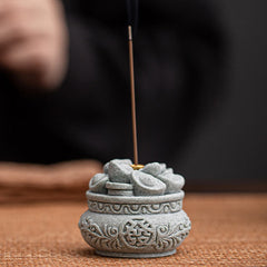 Fu Character Sandstone Incense Burner – burning incense on woven mat with smoke, sandstone incense holder