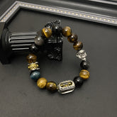 Tiger Eye Bracelet – Mixed gemstone beads with silver lion head on black column, wealth protection jewelry