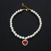 Crystal Heart Pet Necklace – Single strand pearl collar with red heart rhinestone pendant on black background