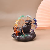 Rainbow Crystal Money Tree – copper wire tree with multicolor gems on dark lotus base, beige setting, Feng Shui charm
