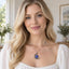 Turkish Blue Evil Eye Necklace - Worn at the front of the neck on a model, blue eye pendant