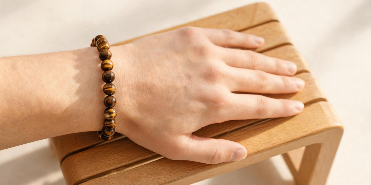 Buddha bracelet worn on the left wrist, showing which wrist to use