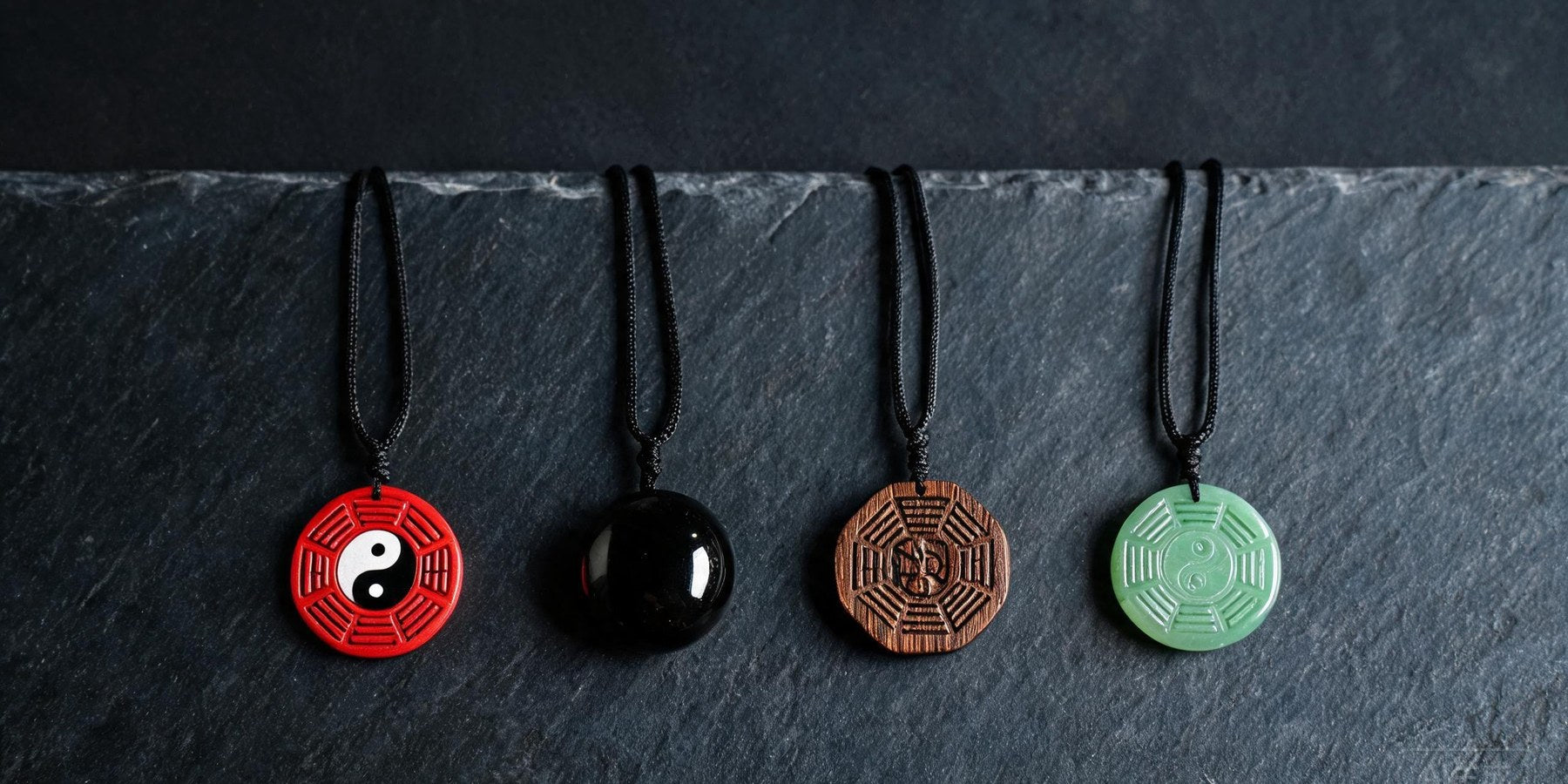 Taoist necklace pendant guide: cinnabar, obsidian, jujube wood and silver pendants compared