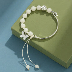 Bodhi Seed Butterfly Lotus Bracelet – Close-up carved butterfly charm, Buddhist prayer wrist mala