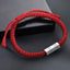 925 Sterling Silver Letter Blessing String Bracelet – Red knotted cord with silver engraved metal bar charm on dark gray surface with lifestyle props