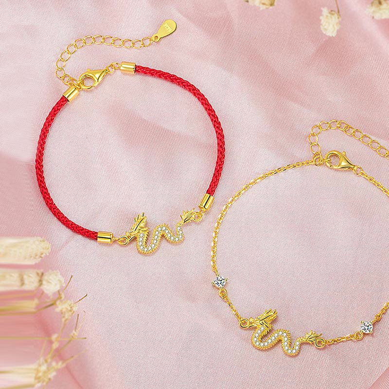 925 Silver Dragon Bracelet - Red cord and gold chain duo on pink fabric with florals, versatile charm