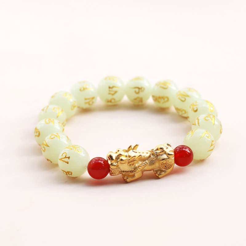 Glowstone Red Agate PiXiu Wealth Bracelet – Cream glowstone beads with gold script and PiXiu on white, wealth charm