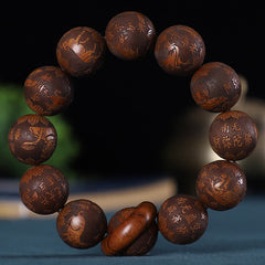 Chinese Zodiac Wood Bracelet – dark wood mala beads with Buddha mantras and zodiac carvings, floating display