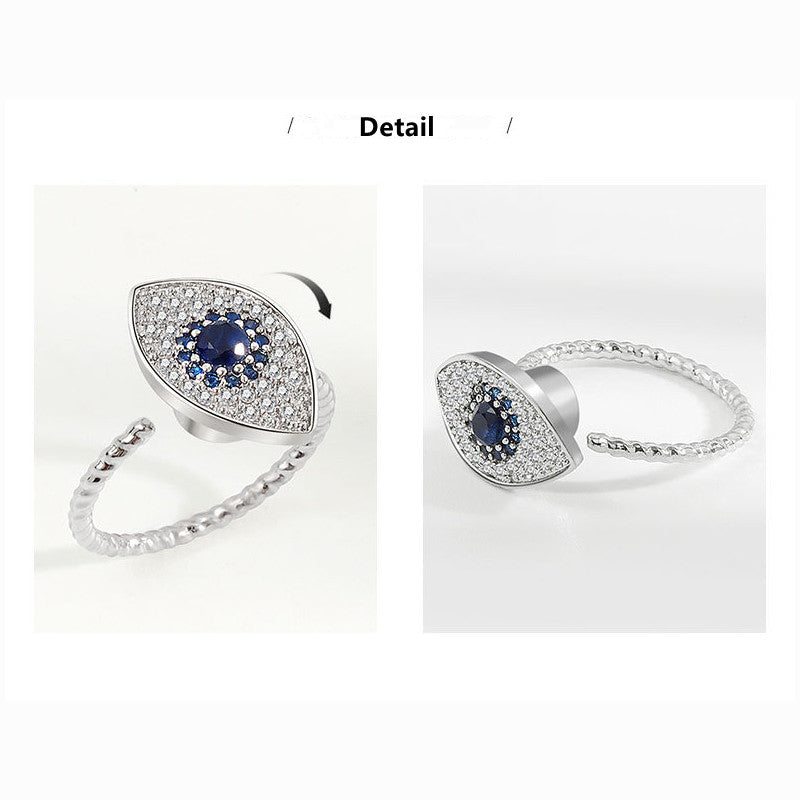 Evil Eye Rotatable Ring – Silver evil eye ring with blue stone, crystal pave, twisted open band
