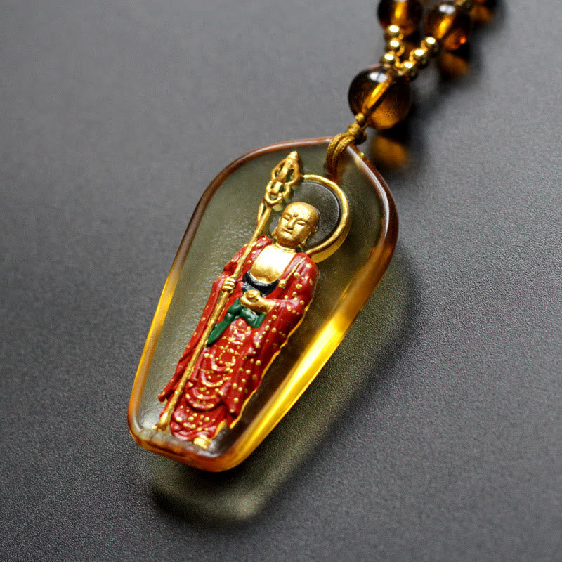 Ksitigarbha Buddha Liuli Crystal Necklace – Glowing amber deity pendant on beaded chain, Buddhist spiritual jewelry