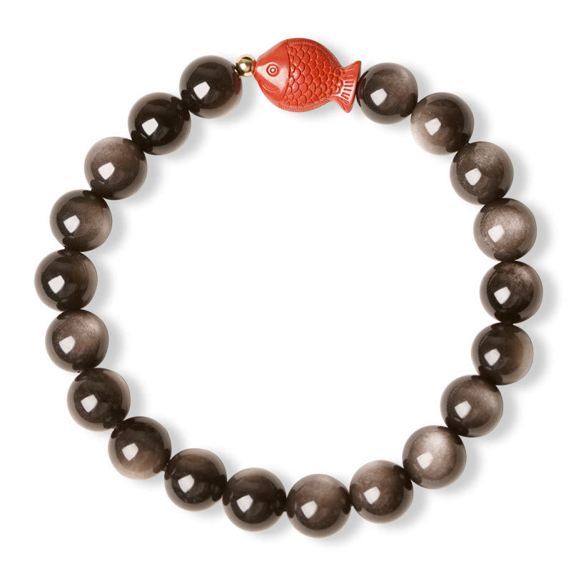 Silver Sheen Obsidian Koi Bracelet – side view, cinnabar red accent, silver sheen reflective beads