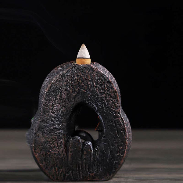 Resin Backflow Incense Burner – Minimalist stone arch on light wood with smoke wisps, wabi-sabi meditation decor