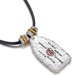 Golden Light Pendant – back of silver talisman with black script and red seal stamp, protection wealth luck amulet
