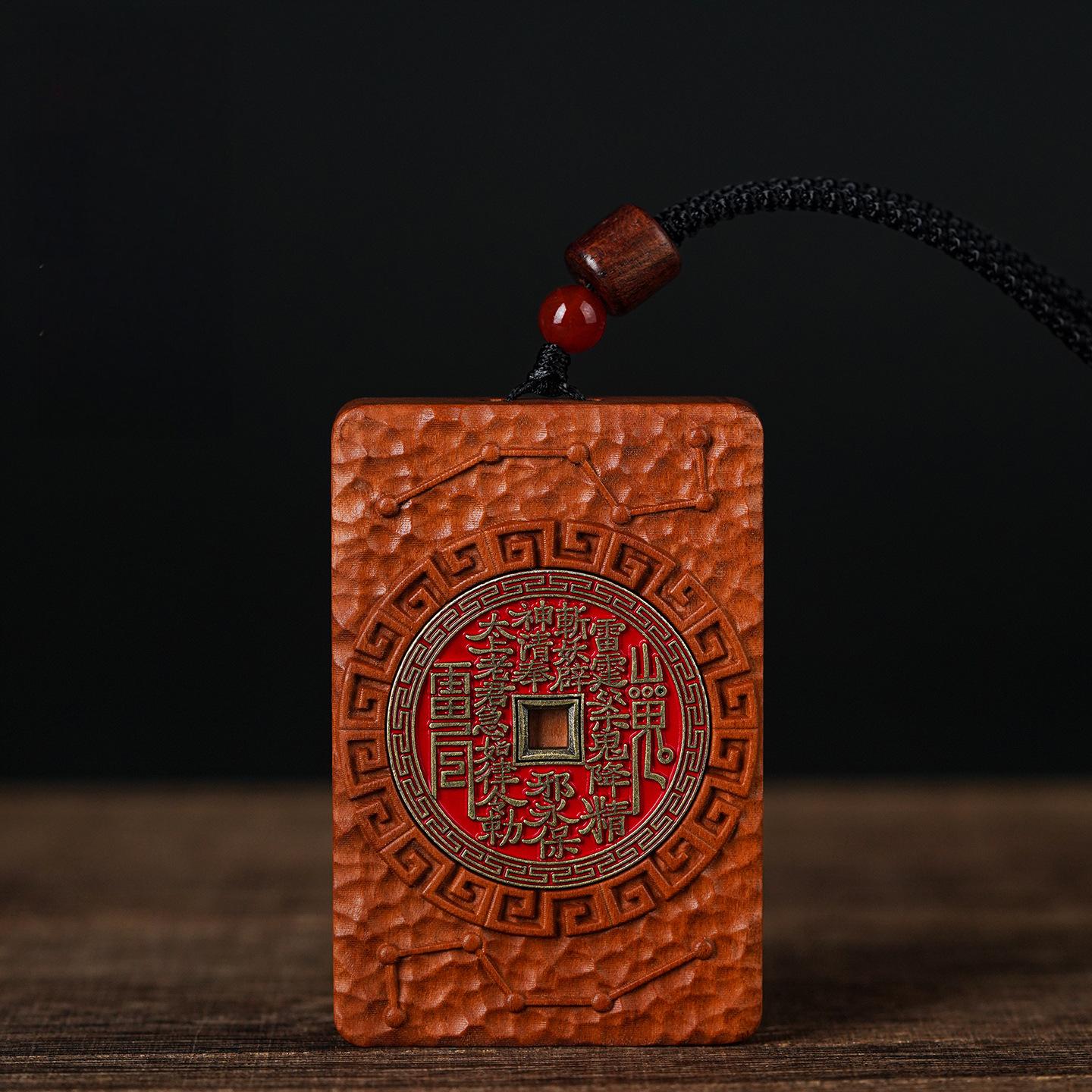 Shan Gui Wood Pendant – jujube wood front red talisman script, black cord red bead detail