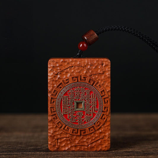 Shan Gui Wood Pendant – jujube wood front red talisman script, black cord red bead detail