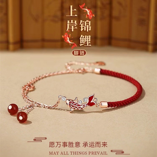 Shang An Koi Anklet – red cord and rose gold chain with red enamel koi and agate beads, bamboo backdrop, gift jewelry