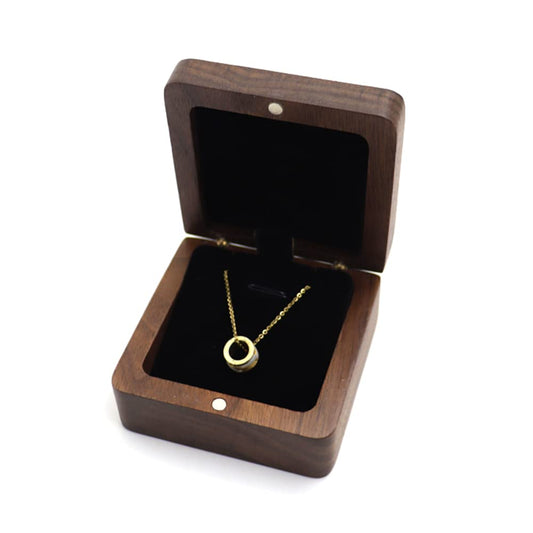 Natural Walnut Necklace Box – open three-quarter view with gold ring pendant on black velvet, vintage