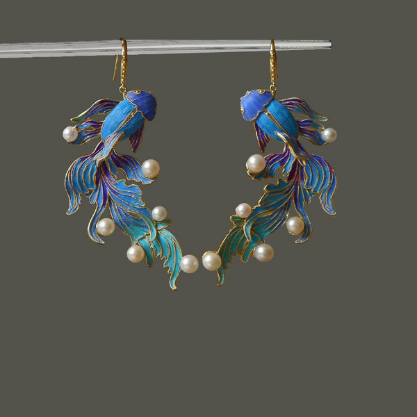 Koi Earrings – Blue enamel koi fish dangle earrings with pearls on gray background hanging from clear rod, Chinese style