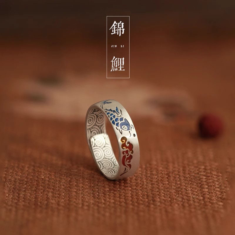 Koi Cloud Ring – Silver band with blue enamel koi fish and red cloud patterns on brown background, unisex luck jewelry