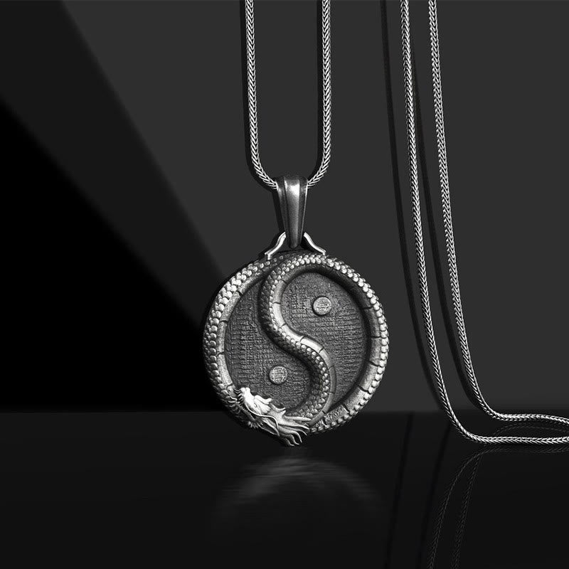 Yin Yang Dragon Pendant – Antiqued silver medallion with sculpted dragon S-curve on black, Spiritual