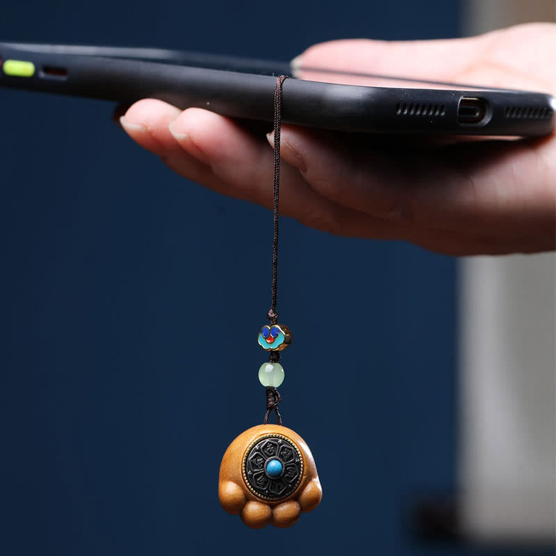 Sandalwood Om Mani Padme Hum Lucky Cat Paw Phone Charm - Dangling from phone, carved paw detail