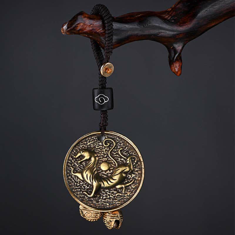 Four Symbols Constellation Key Chain - Antique brass tiger medallion with bells on dark background, Courage