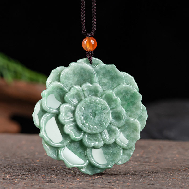 Jade Lotus Pendant Necklace – jade lotus carving on dark wood with foliage background, Natural