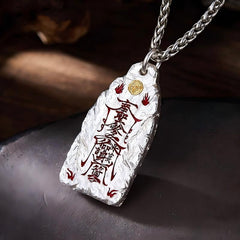 Golden Light Pendant – silver amulet with red symbols and gold accent on silver chain, protection wealth luck amulet