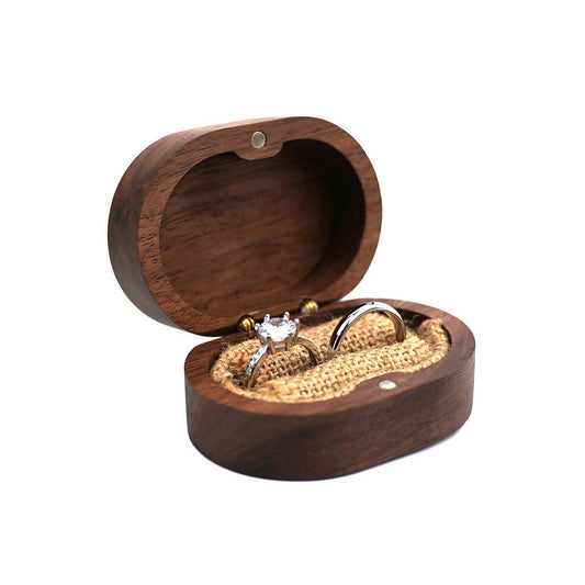 Mr & Mrs Walnut Wood Ring Box – open three-quarter view showing burlap interior and magnetic closure