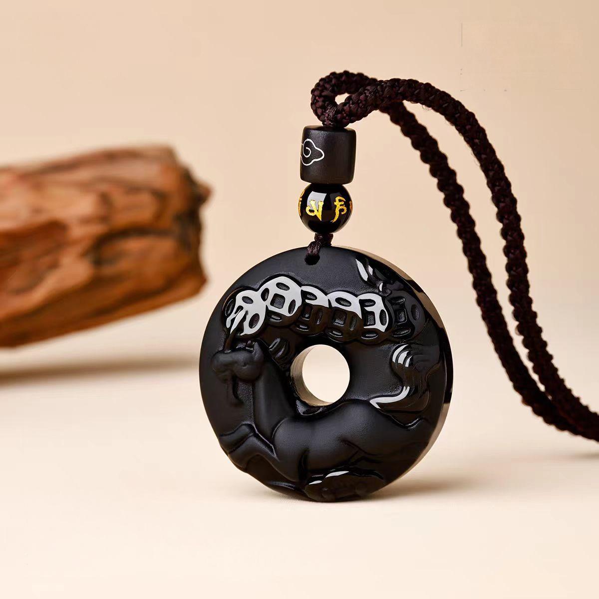 Black Obsidian Necklace – horse disc side view with wood decor, brown cord detail shown