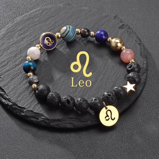Zodiac Crystal Beaded Bracelet – Leo on dark slate with blue sandstone charm and gold zodiac disc