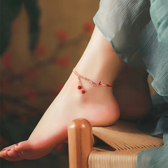 Shang An Koi Anklet – worn on ankle with blue chiffon dress and wooden stool, bohemian luck anklet style