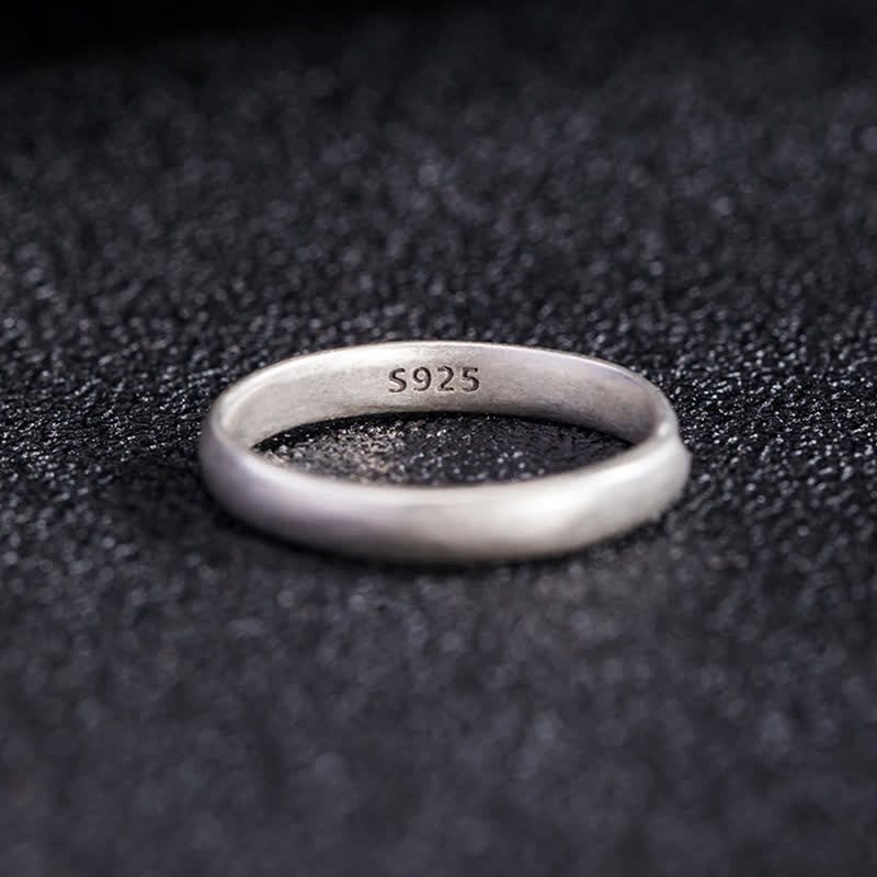 Lotus Enlightenment Ring - S925 hallmark on interior band, dark granular background, authentic