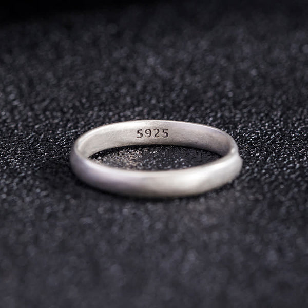 Lotus Enlightenment Ring - S925 hallmark on interior band, dark granular background, authentic