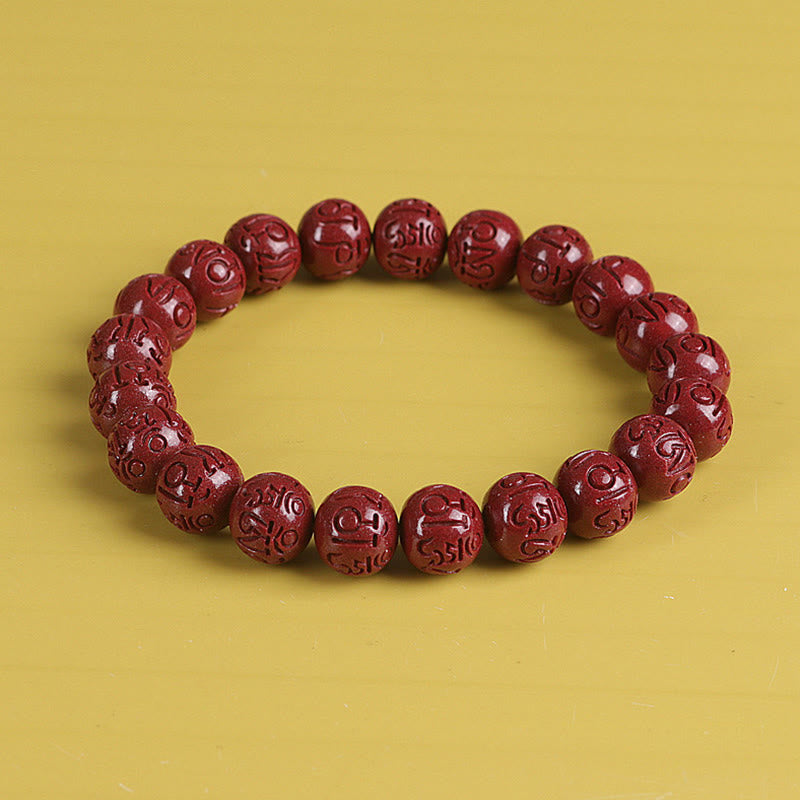 Double PiXiu Cinnabar Bracelet – Carved Om Mani Padme Hum beads circle on yellow background, prayer jewelry