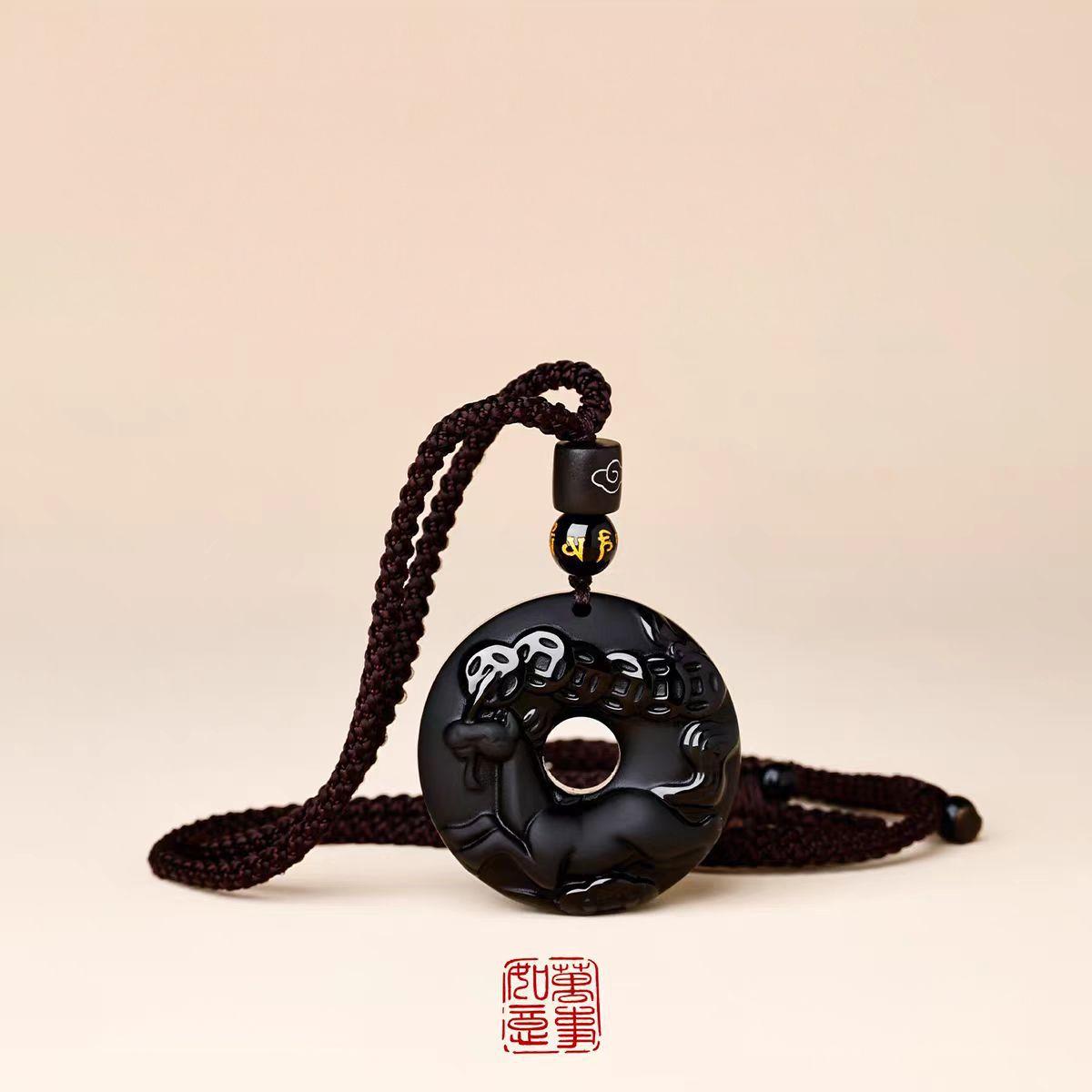 Black Obsidian Necklace – horse disc flat lay cord loop, red seal stamp accent below