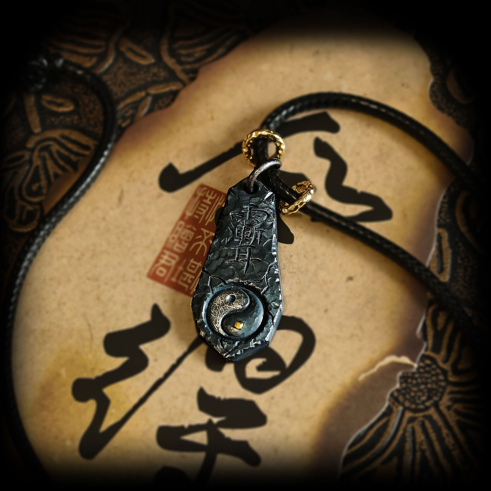 Tai Chi Big Dipper Necklace – black pendant with engraved Tai Chi and gold loop on leather cord, cosmic harmony necklace