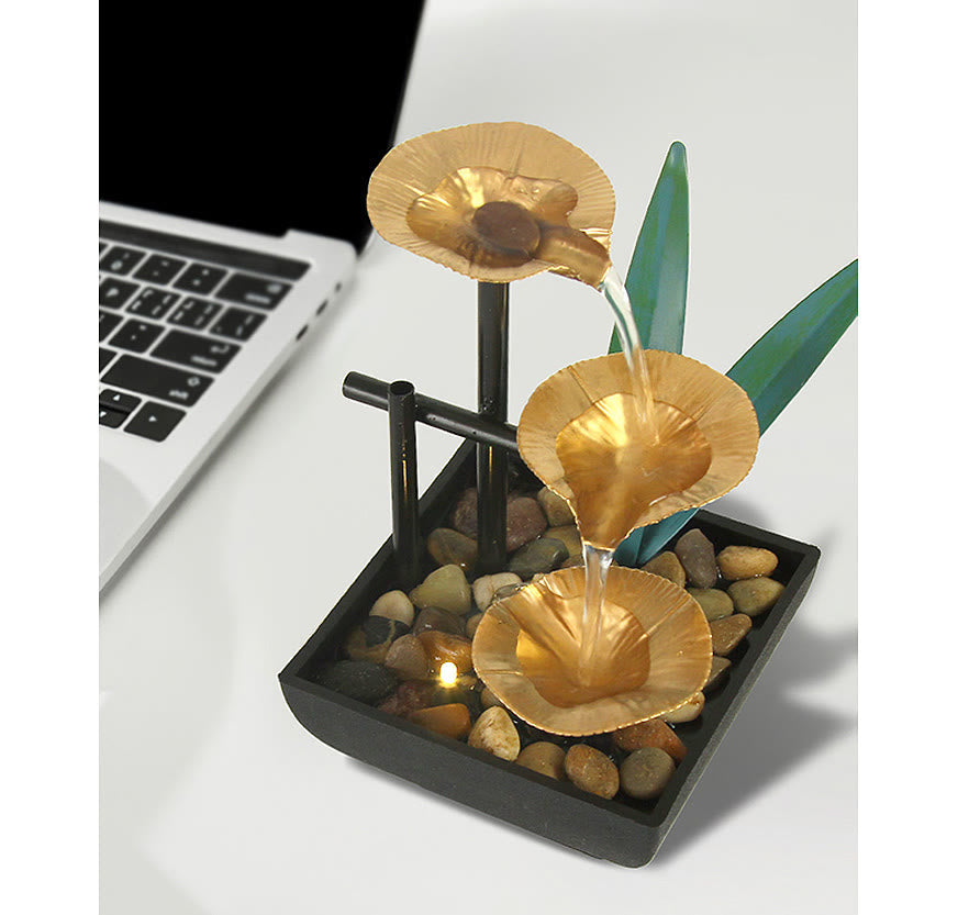 Three Layers Lotus Waterfall Fountain - Gold tiers on desk with laptop for scale, Focused