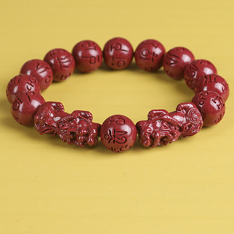 Double PiXiu Cinnabar Bracelet – Slightly angled front view of red cinnabar PiXiu bracelet, prosperity jewelry