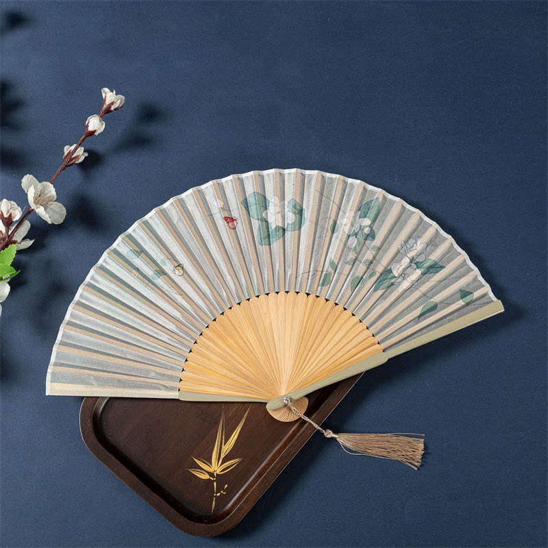 Lotus Begonia Jasmine Handheld Bamboo Folding Fan - lotus leaves jasmine flowers with ladybug, beige tassel