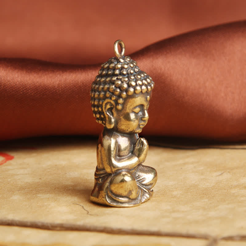 Compassion Buddha Keychain – side profile, copper metal finish