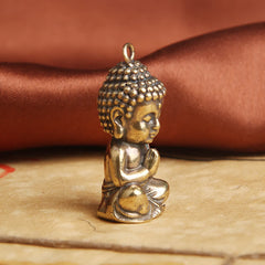 Compassion Buddha Keychain – side profile, copper metal finish
